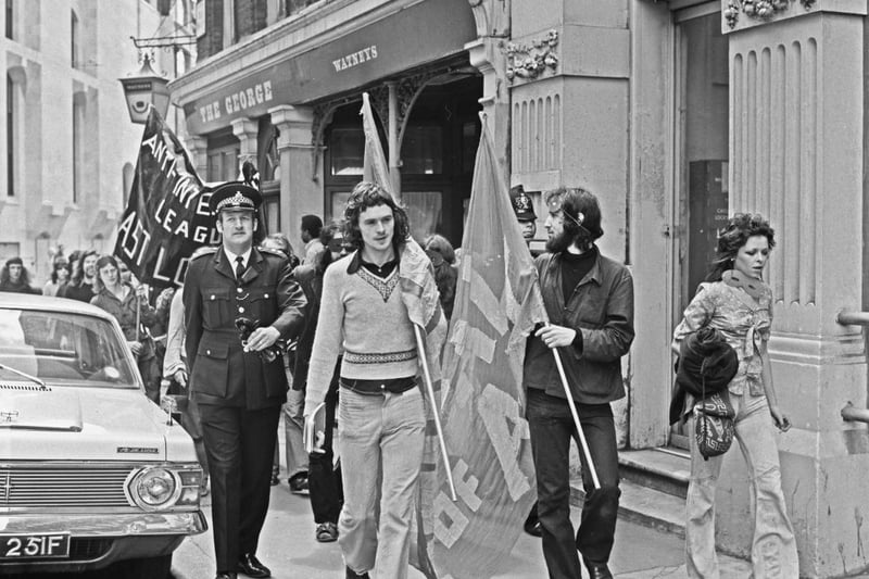 The Angry Brigade march past The George  to protest at the Old Bailey trial of their members for a number of small-scale bombings. Behind them is a banner which reads ‘Anti-Internment League East London’. The pub was badly damaged the following year in an IRA bombing outside the Old Bailey.