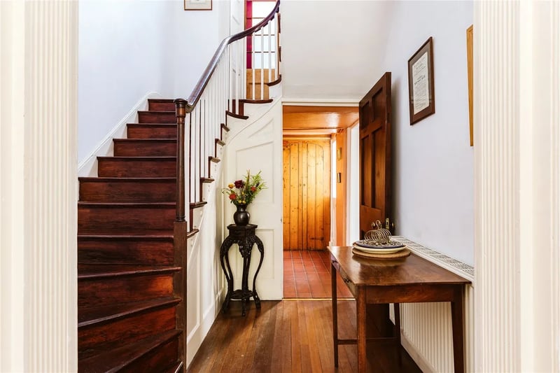 Step inside the property and you’ll find an impressive entrance hall with a sweeping staircase that winds to the floors above.