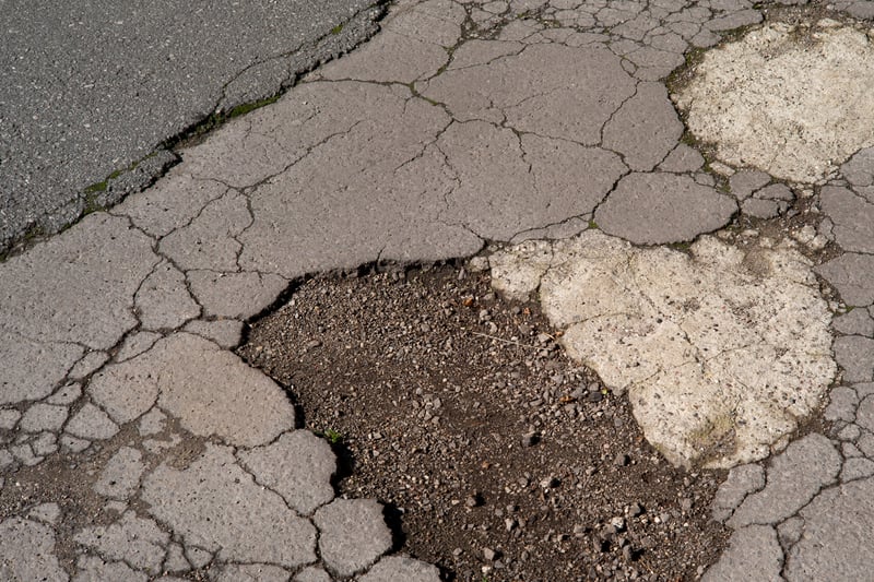 In 2022-23, Knowsley Council received seven customer service requests regarding potholes on East Lancashire Road. (note - picture is a stock image)