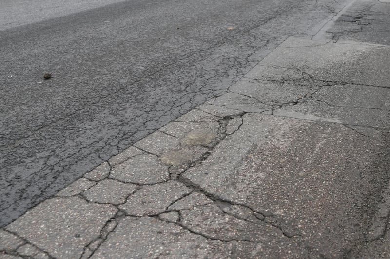 In 2022-23, Knowsley Council received four customer service requests regarding potholes on Hollies Road. (note - picture is a stock image)