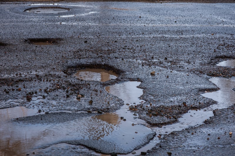 In 2022-23, Knowsley Council received nine customer service requests regarding potholes on Church Road, Roby. (note - picture is a stock image)