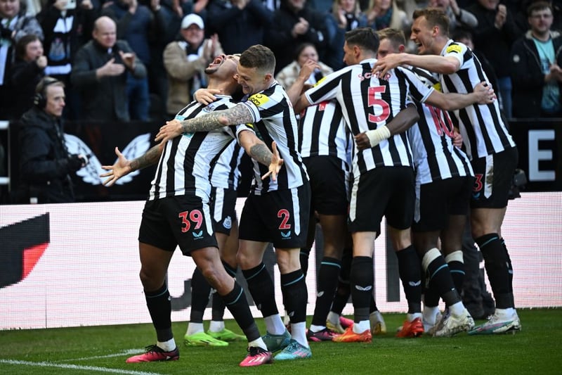 Newcastle United’s Brazilian midfielder Bruno Guimaraes (L) and Newcastle United’s players celebrate after Newcastle United’s English midfielder Joe Willock scores the opening goal of the English Premier League football match between Newcastle United and Manchester United at St James’ Park in Newcastle-upon-Tyne, north east England on April 2, 2023. (Photo by Oli SCARFF / AFP) 