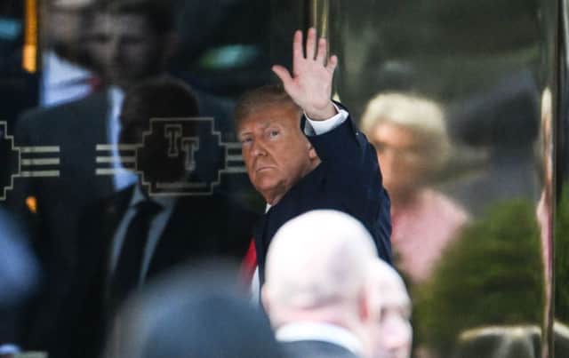 Donald Trump arrives in Trump Tower on Monday evening. Credit: Getty