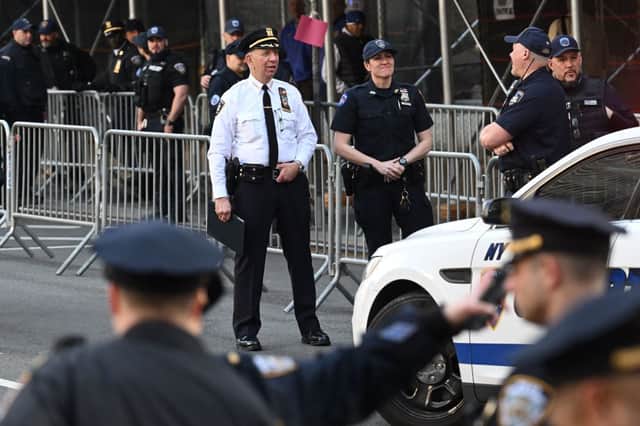 Police guard outside the Manhattan courthouse ahead of Donald Trump's appearance. Credit: Getty