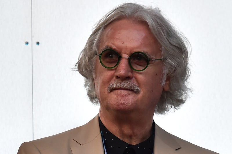 Scottish comedian Billy Connolly awaits the start of the opening ceremony of the 2014 Commonwealth Games at Celtic Park in Glasgow.