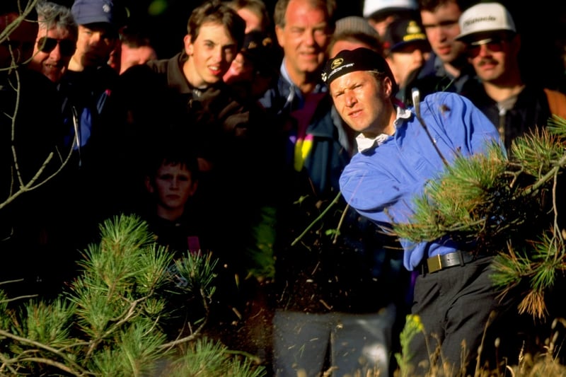 Per-Ulrik Johansson of Sweden plays out from the rough during the 1998 British Open held at Royal Birkdale, Southport.