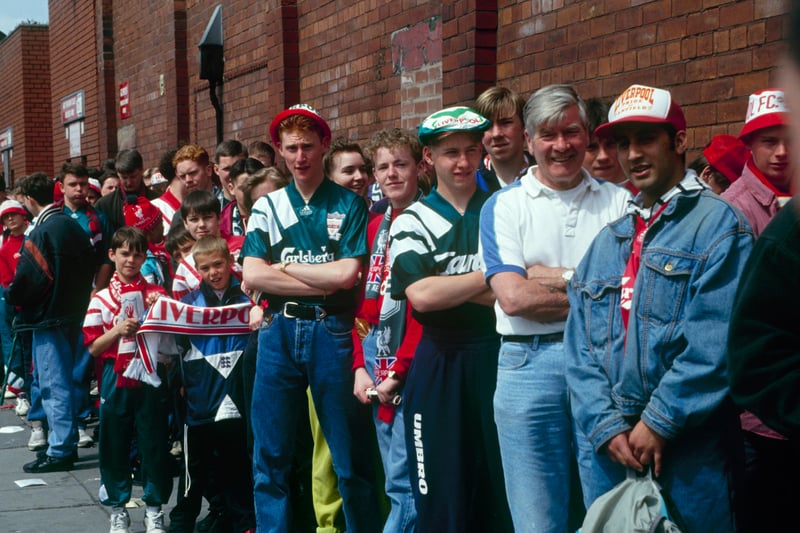 Liverpool FC fans line up to gain entry onto the Spion Kop stand, Anfield for the very last time to watch a football match during the FA Carling Premiership match between Liverpool and Norwich City held on April 30, 1994.