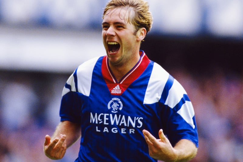 Striker Ally McCoist celebrates after scoring the second goal in a 3-1 win against Aberdeen