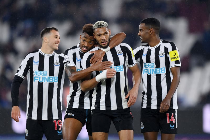 Joelinton of Newcastle United is congratulated by Joe Willock after scoring the team's fifth goal during the Premier League match between West Ham United and Newcastle United at London Stadium on April 05, 2023 in London, England. (Photo by Justin Setterfield/Getty Images)