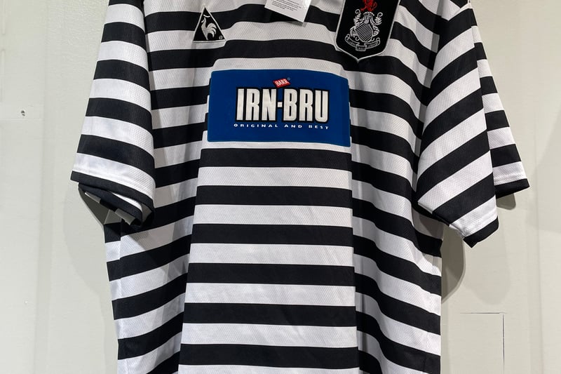 Queen’s Park 1998/01 - Featuring their iconic white and black hoops along with long time sponsor Irn-Bru. They are currently a club on the rise. The team won promotion to the Second Division in this jersey.  