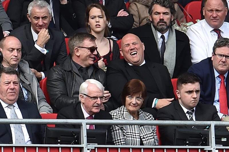 Raised in and around Merseyside, the actor has been a lifelong Liverpool fan. He is said to idolise Steven Gerrard and one match the then captain of Liverpool waited in the foyer at Anfield in order to get a picture with ‘James Bond’. He is pictured here at the Merseyside derby in 2017.