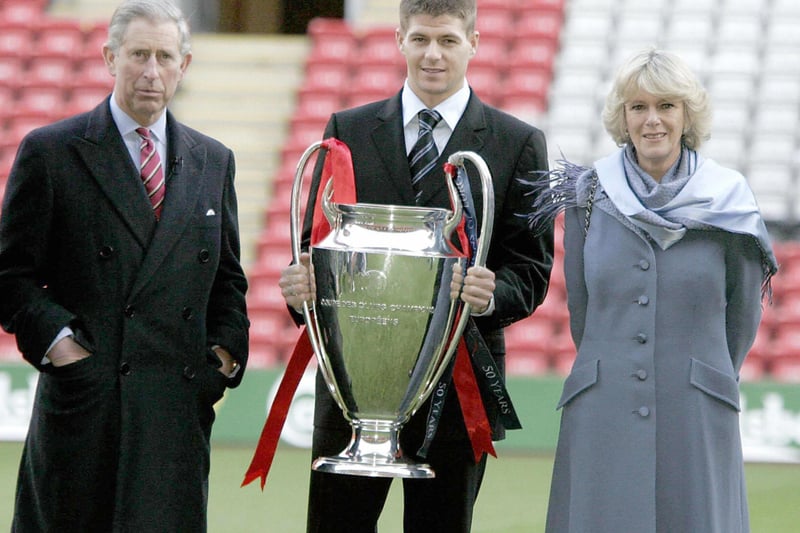 Prince Charles at the time, the future king enjoyed a cup of tea in the Anfield dressing room before posing with the Duchess of Cornwall and Liverpool captain Steven Gerrard   holding the Champions league trophy in  2005.