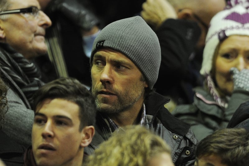 Liverpudlian comedian John Bishop has been a Reds fan for many years. He’s pictured here watching on from the stands during the Premier League Match between Liverpool and Leicester City at Anfield in 2015.