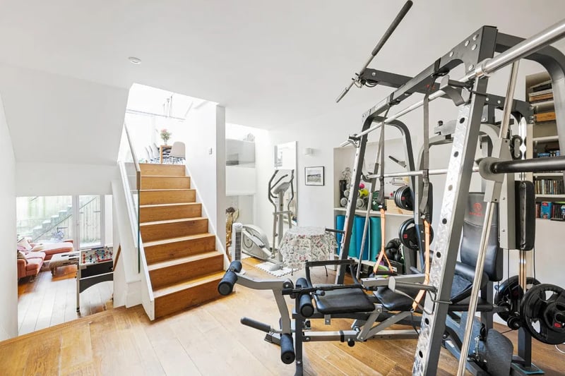 The basement has oodles of space and potential. It’s currently being used as a home gym.