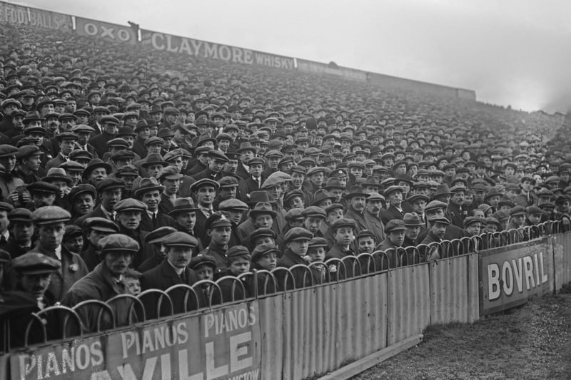 Hoardings advertise Claymore whisky, Oxo, Saville Pianos and Bovril at an FA Cup third round match, between Tottenham Hotspur and West Ham United, at White Hart Lane on February  21 1920. Spurs won 3-0. (Photo by Thompson/Topical Press Agency/Hulton Archive/Getty Images)