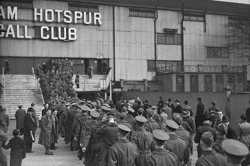 British soldiers on leave, queuing outside White Hart Lane - but this was for a match between Arsenal and Chelsea on March 23, 1940. Highbury was used as ‘air raid precautions’ centre during the Second World War and Arsenal played home matches at their rivals’ ground. (Photo by H. F. Davis/Topical Press Agency/Hulton Archive/Getty Images)