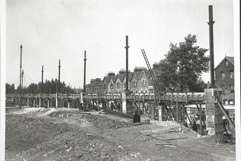 Highbury was built in 1913, with this image showing construction work on one of its new stands.