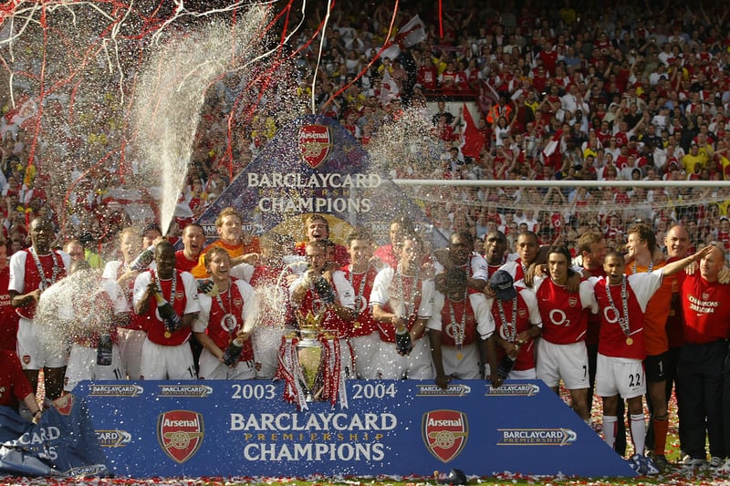 Arsenal celebrates winning the Premiership title and defeating Leicester City May 15, 2004 at Highbury. Arsenal defeated Leicester City 2-1 and finish the season undefeated.