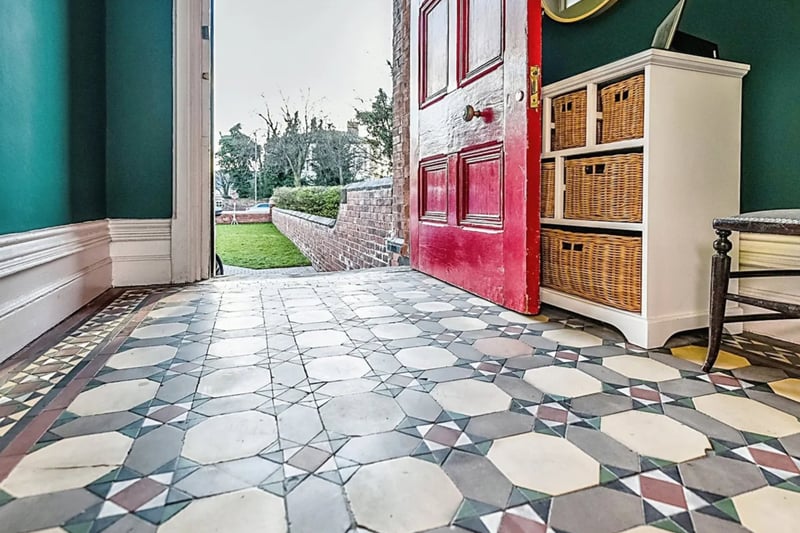 Vestibule -  front door opening onto driveway and original tiled flooring leading into entrance hall.