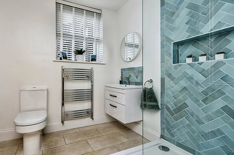 Shower Room - Bespoke wooden framed window, tiled flooring with underflooring heating, walk-in shower, floating sink.