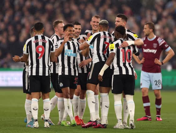 Joelinton of Newcastle United celebrates with teammates after scoring the team's second goal during the Premier League match between West Ham United and Newcastle United at London Stadium on April 05, 2023 in London, England. (Photo by Alex Pantling/Getty Images)