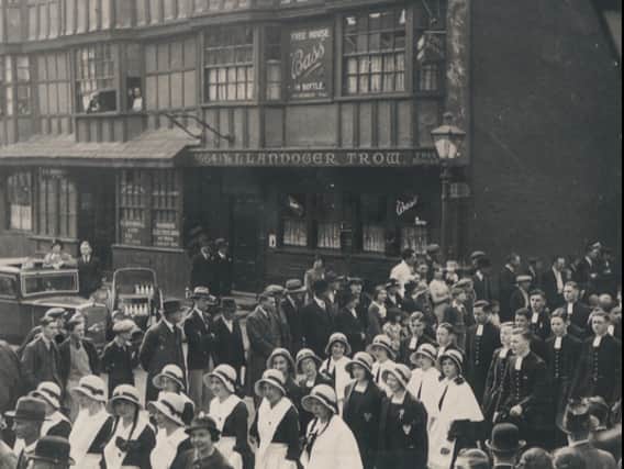 The annual procession of girls from Red Maid’s school pass The Llandoger Trow in the 1930s - the pub is among the oldest in the city.