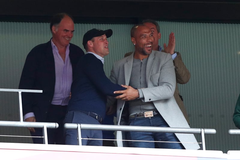 Prince William celebrates a Villa goal with former striker John Carew during the play-off final match against Derby County in 2019.