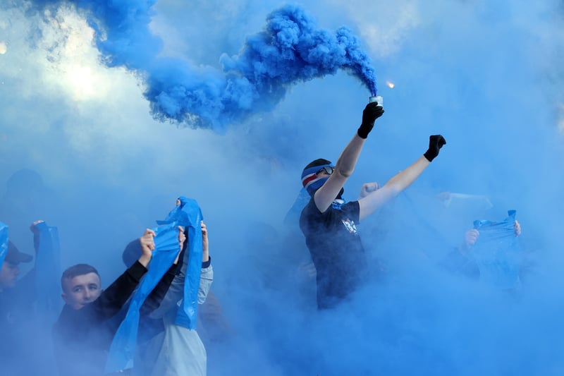 Supporters show their support by setting off blue smoke bombs during the Viaplay Cup Final against Celtic at Hampden Park on February 26.