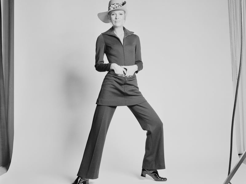 Quant designed clothes which would make everyone feel comfortable, so for those who did not want to wear a miniskirt alone she created other pieces. Model Viki Nixon is pictured wearing a brown jersey jumpsuit with matching mini skirt by Quant on 30 June 1969.