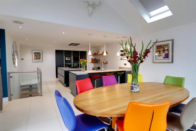 The large kitchen and dining room area is beautifully appointed and has a gable end which is fully glazed with stunning views.
