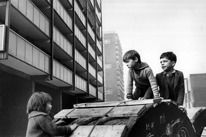 Children playing beside modern tower blocks in the Gorbals. The tenements which had formerly occupied the site were among the worst slums in Britain and there had been campaigns to redevelop the area for many years before work finally began in the late fifties. 
