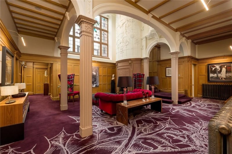 This area of the property gives a flavour of what is to come with rich wood panelling and vaulted ceilings. 