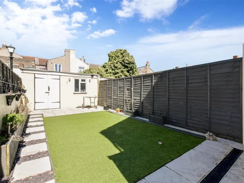 The garden comes with a spacious shed for storage