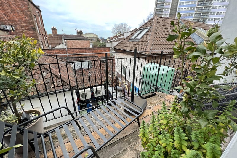 The property includes a top floor balcony