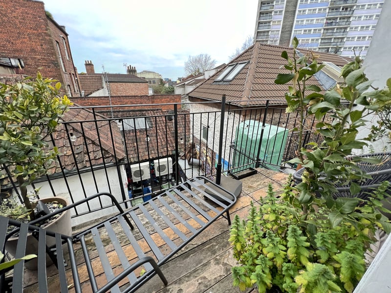 The property includes a top floor balcony