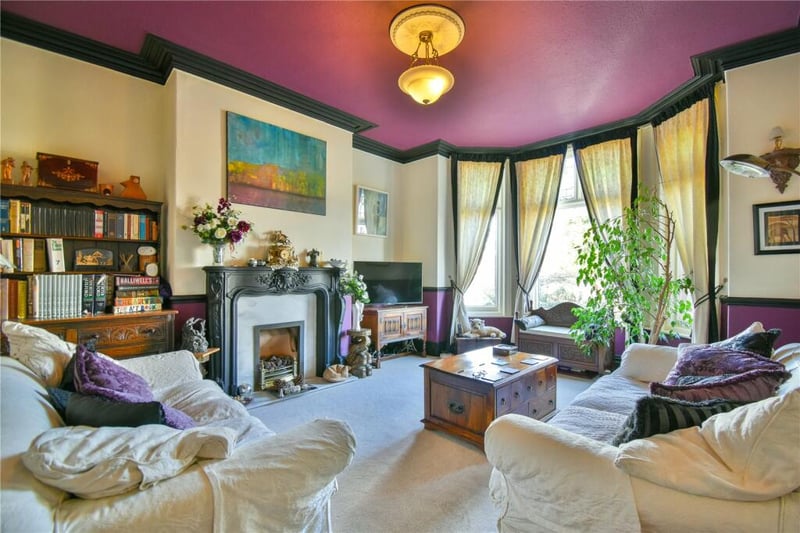 Purple ceilings in the large sitting room.
