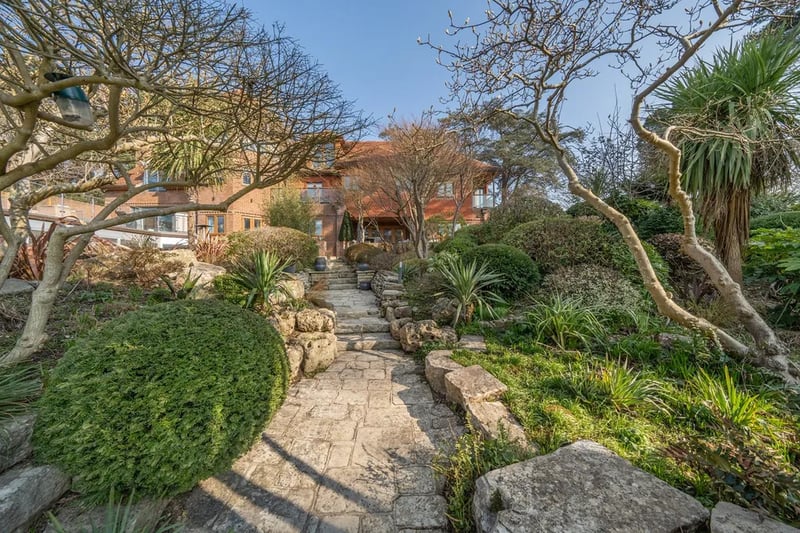 This property comes with landscaped gardens