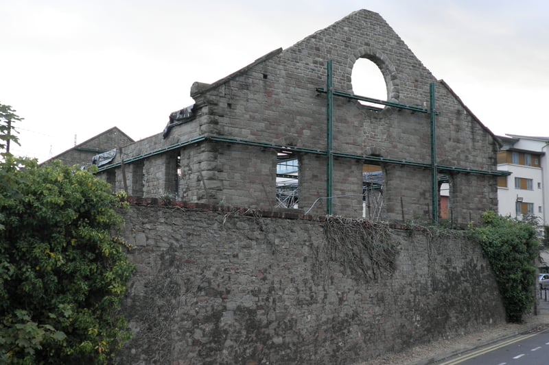 This building was completed in 1840 for Bristol and Clifton Oil Company. It is now a derelict shell with no roof, major internal damage and general erosion and decay to the exterior.