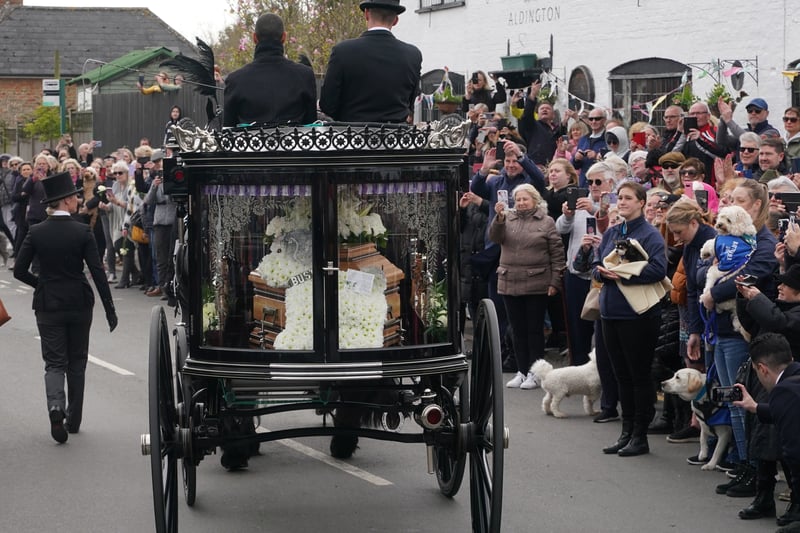 The funeral cortege of Paul O’Grady travels through the village of Aldington, Kent ahead of his funeral at St Rumwold’s Church. 