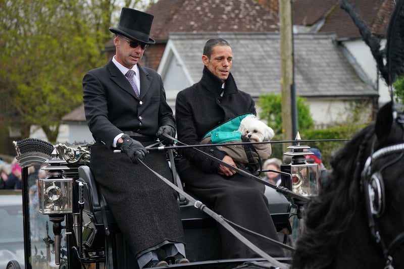 Paul O’Grady’s husband travels with the funeral cortege ahead of his funeral at St Rumwold’s Church. 