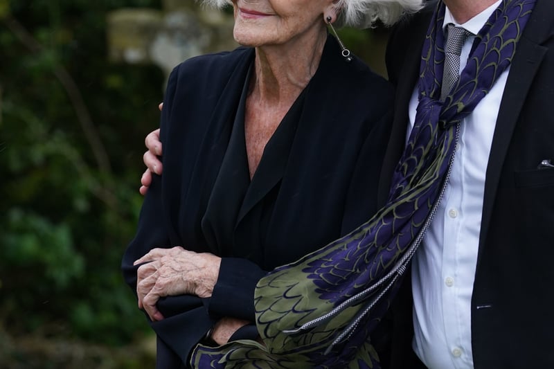 Dame Sheila Hancock and Lord Michael Cashman arriving for the funeral of Paul O'Grady at St Rumwold's Church in Aldington, Kent. 