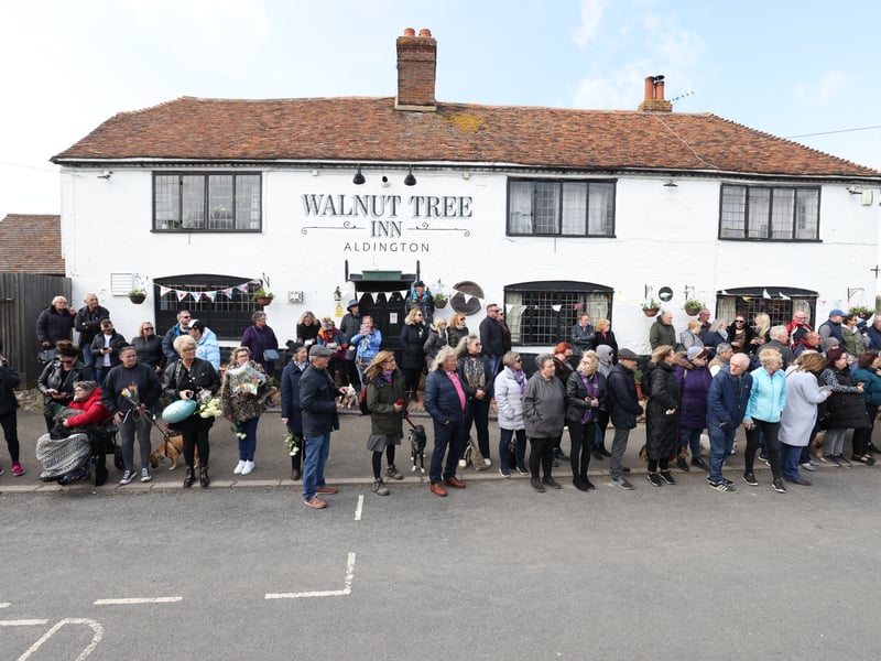 Wellwishers line the route of the funeral cortege during the Funeral of Paul O’Grady
