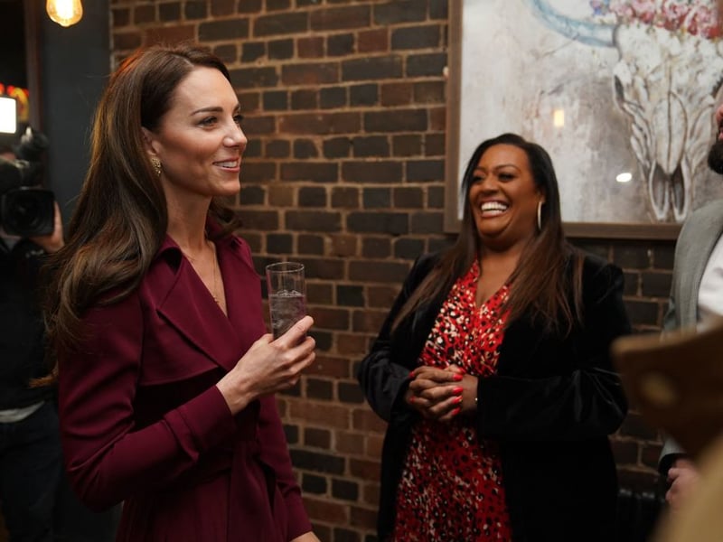 Britain's Catherine, Princess of Wales (L) speaks with TV presenter Alison Hammond (C) during a visit to The Rectory in Birmingham on April 20, 2023, where she met future leaders and local business owners from Birmingham's creative industries sector