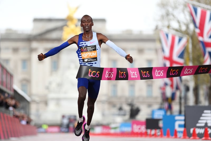 Kelvin Kiptum of Kenya crosses the finish line to win the Elite Men’s Marathon. (Photo by Alex Davidson/Getty Images)