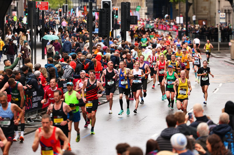 Competitors and supporters at the 2023 TCS London Marathon. (Photo by Andrew Redington/Getty Images)