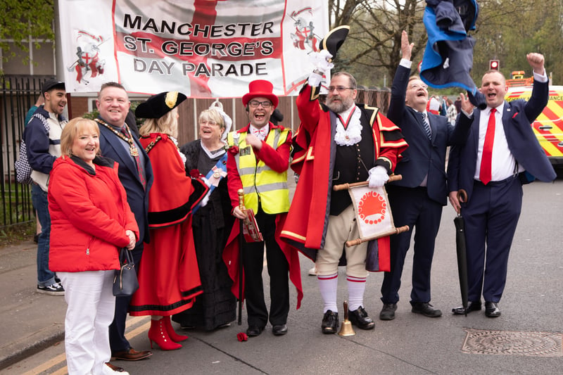 The Lord Mayor of Manchester with organisers and the parade banner at the start of the event. Photo: Tony Gribben