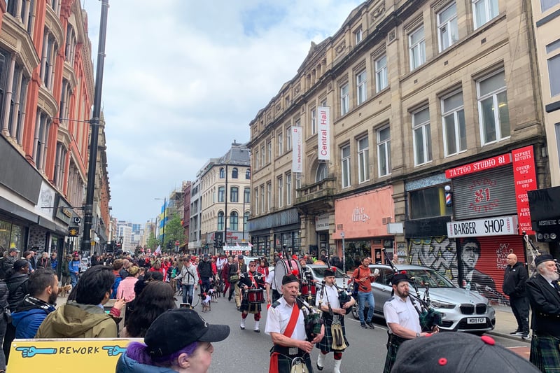 One of the pipe bands playing as the procession wends its way through the Northern Quarter. Photo: Nik Anand