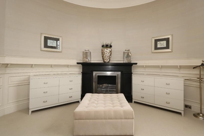 One of the finest features of the master bedroom is this stunning fireplace. 