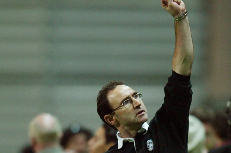 Celtic boss Martin O’Neill celebrates after the victory in Portugal.