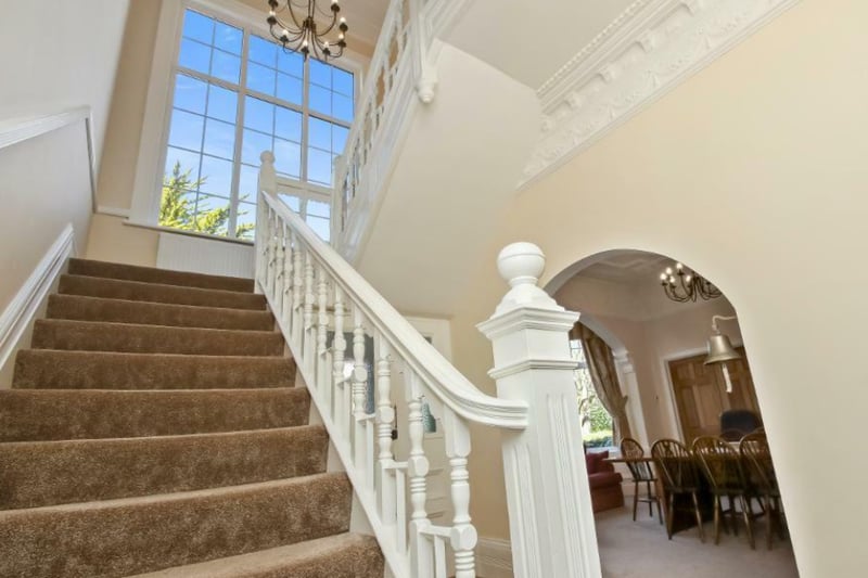 The impressive home has four floors and tons of character.